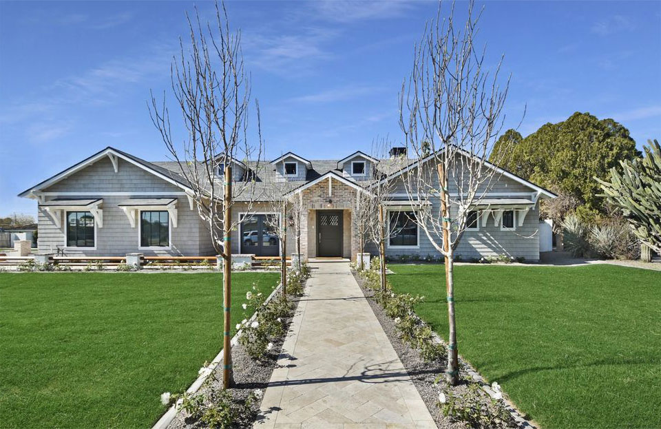 House exterior. View of front yard and small entrance porch